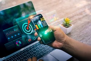 AI digital marketing dashboard on mobile and laptop for business growth in the UAE